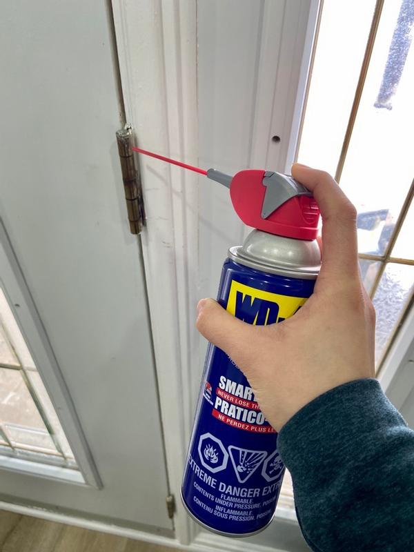 Graissage de la quincaillerie d'une porte-fenêtre